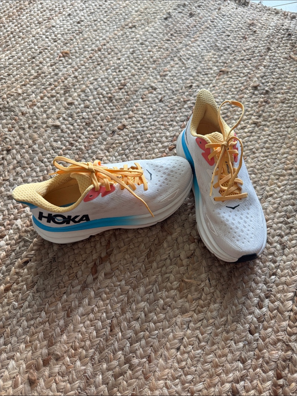 Hoka Women’s White Sneakers with Yellow, Pink & Blue Accents